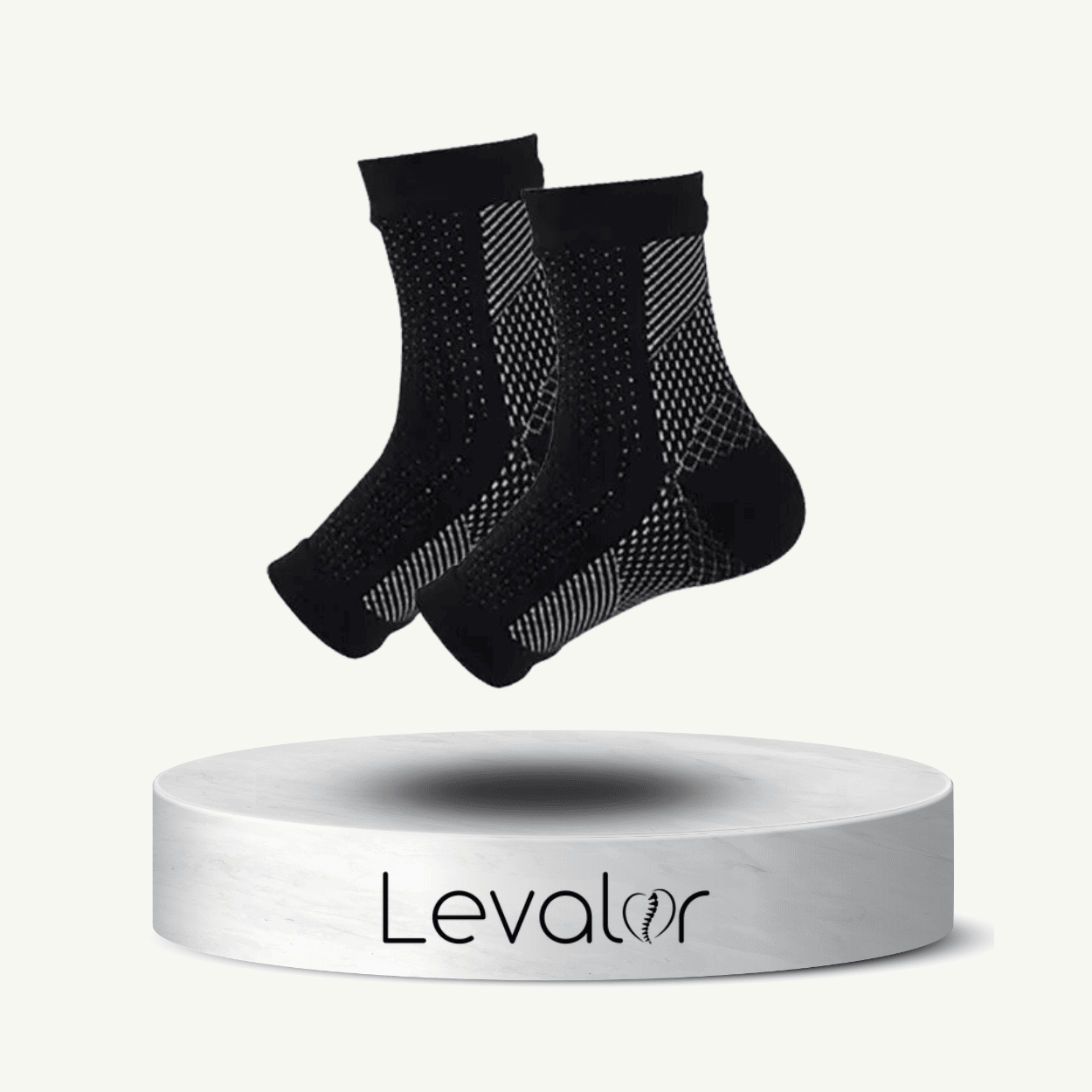 chaussette de compression levalor de couleur noir et grise, une solution idéale contre les jambes lourdes et gonflées. Recommandé pour la circulation sanguine et les œdèmes